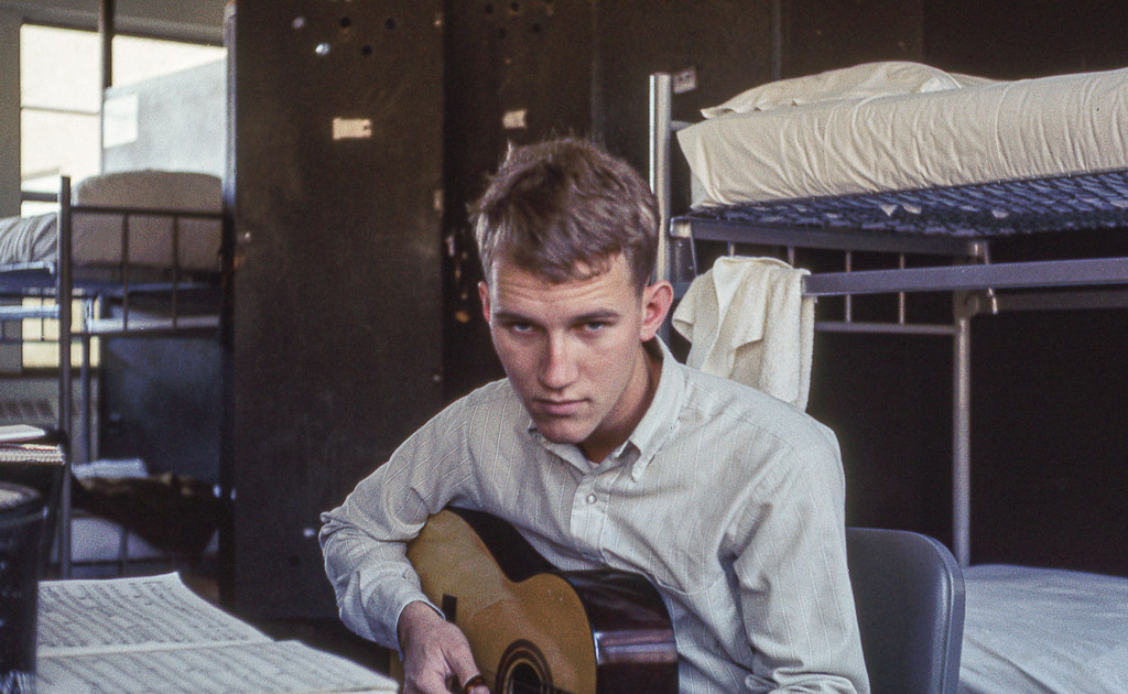 John playing guitar in Navy barracks in Milllington, TN