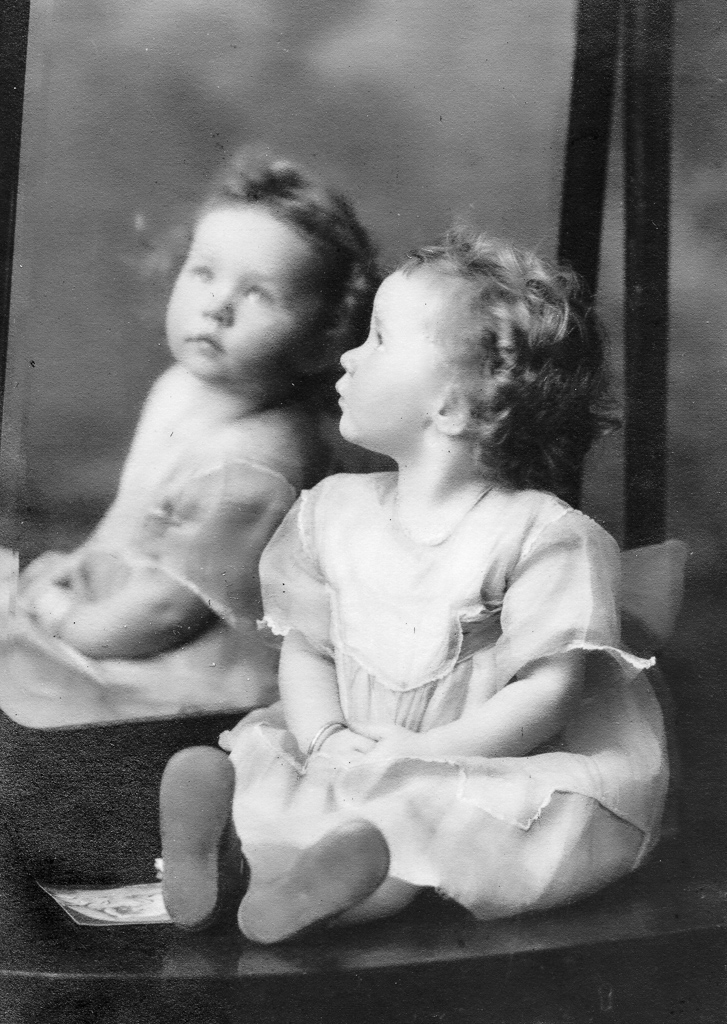 Photos of Betty Pratt taken in front of a mirror, circa 1923