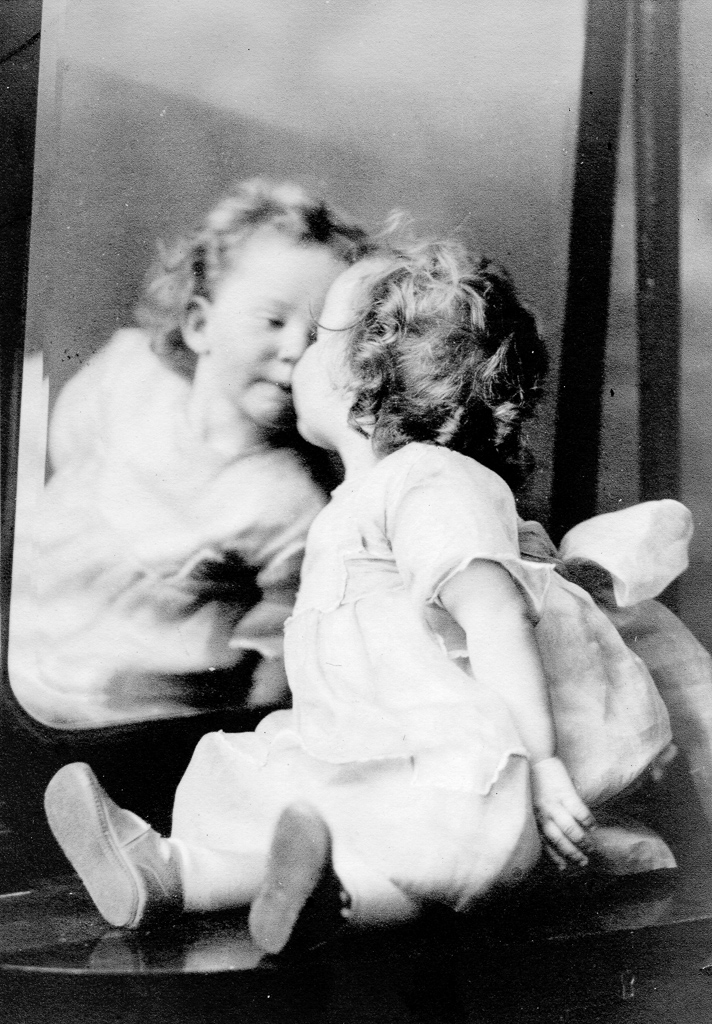 Photos of Betty Pratt taken in front of a mirror, circa 1923