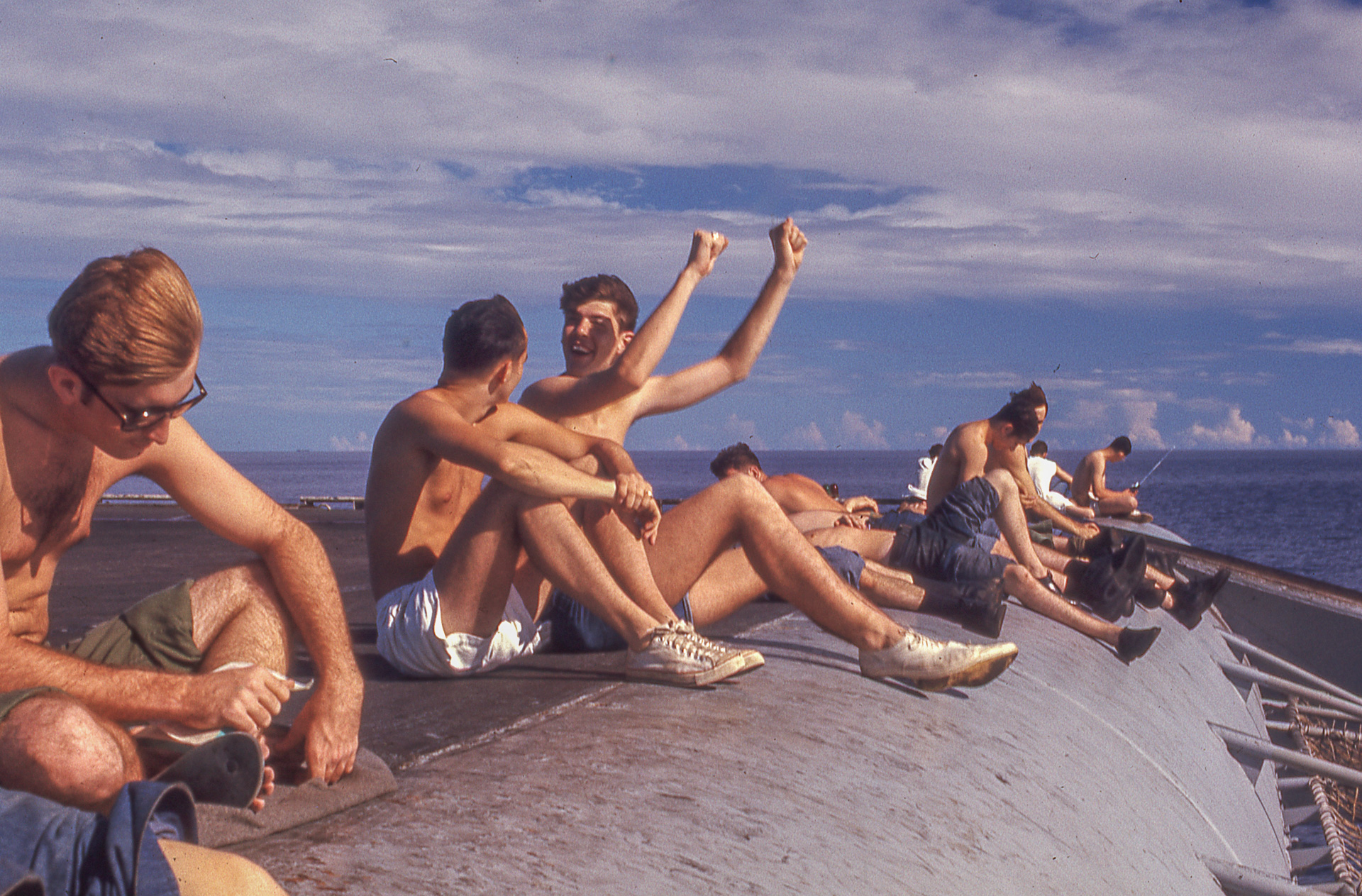 Flight Deck Sailors sunning themselve on the flight deck