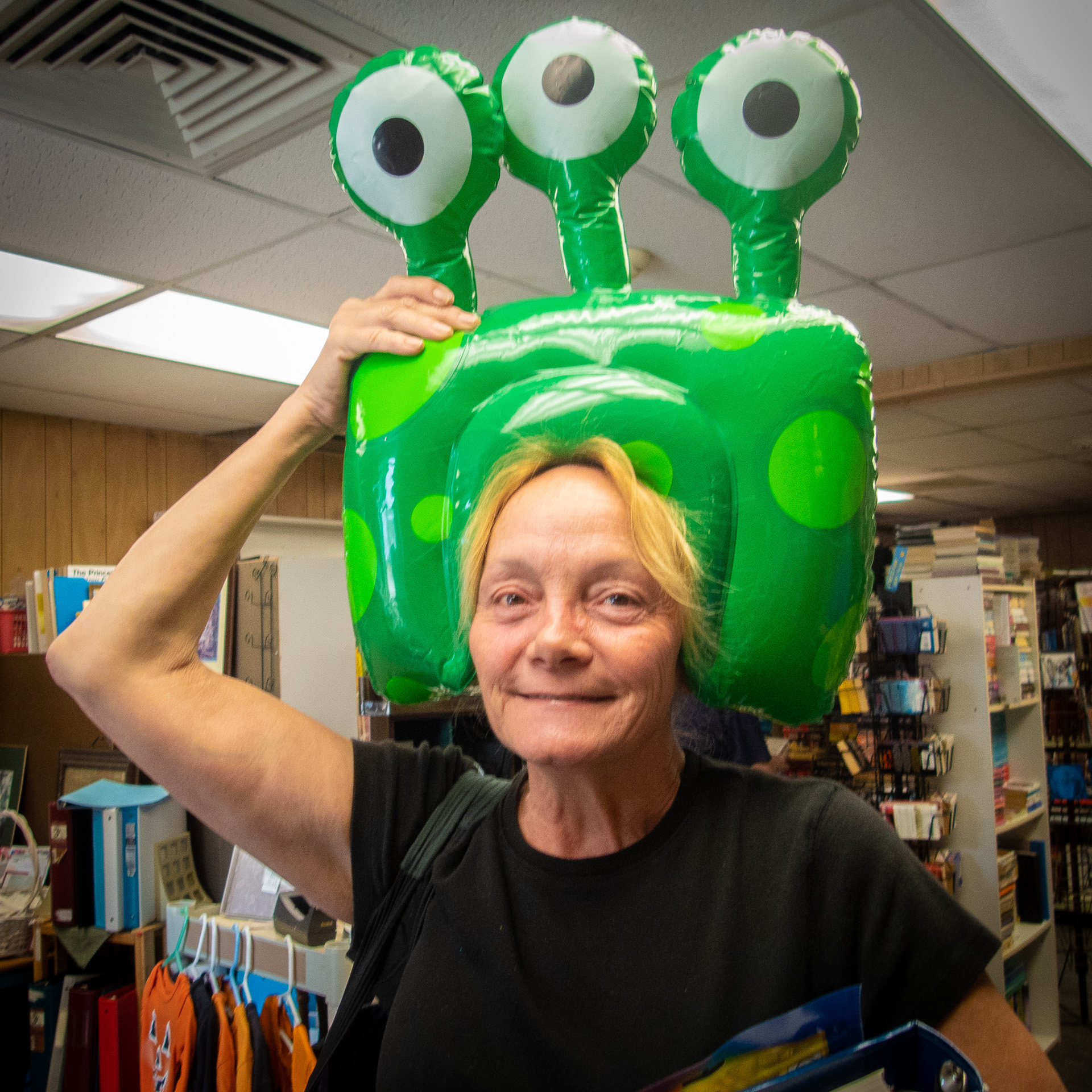 One of our Patrons models one of the unique costumes available at the Green Center (New Ipswich, NH) Three Eyed Green Monster