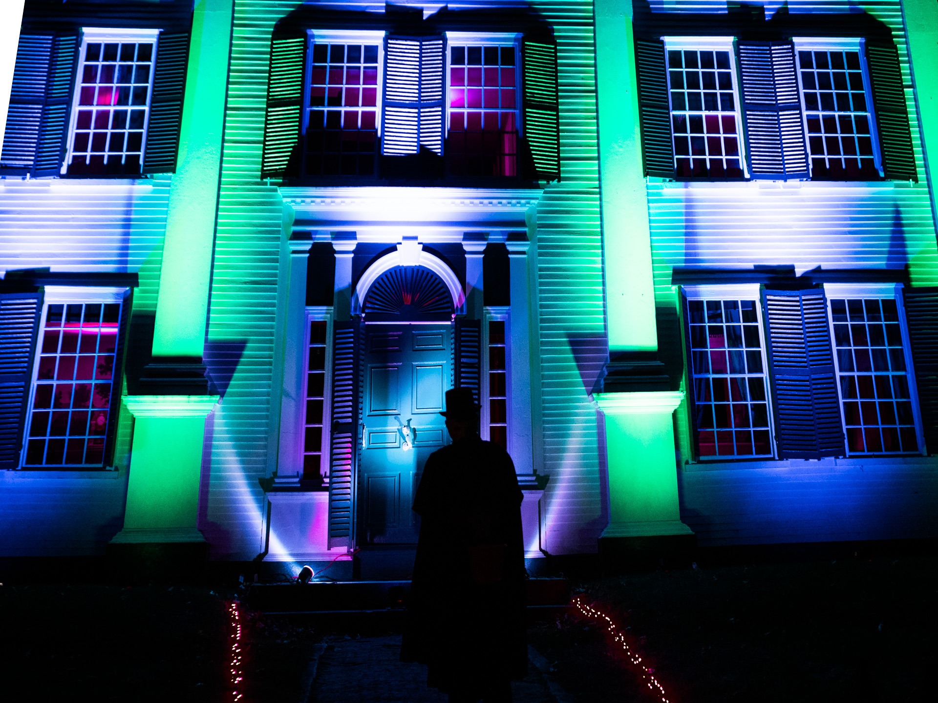 A mysterious figure approaches the Barrett House on Halloween