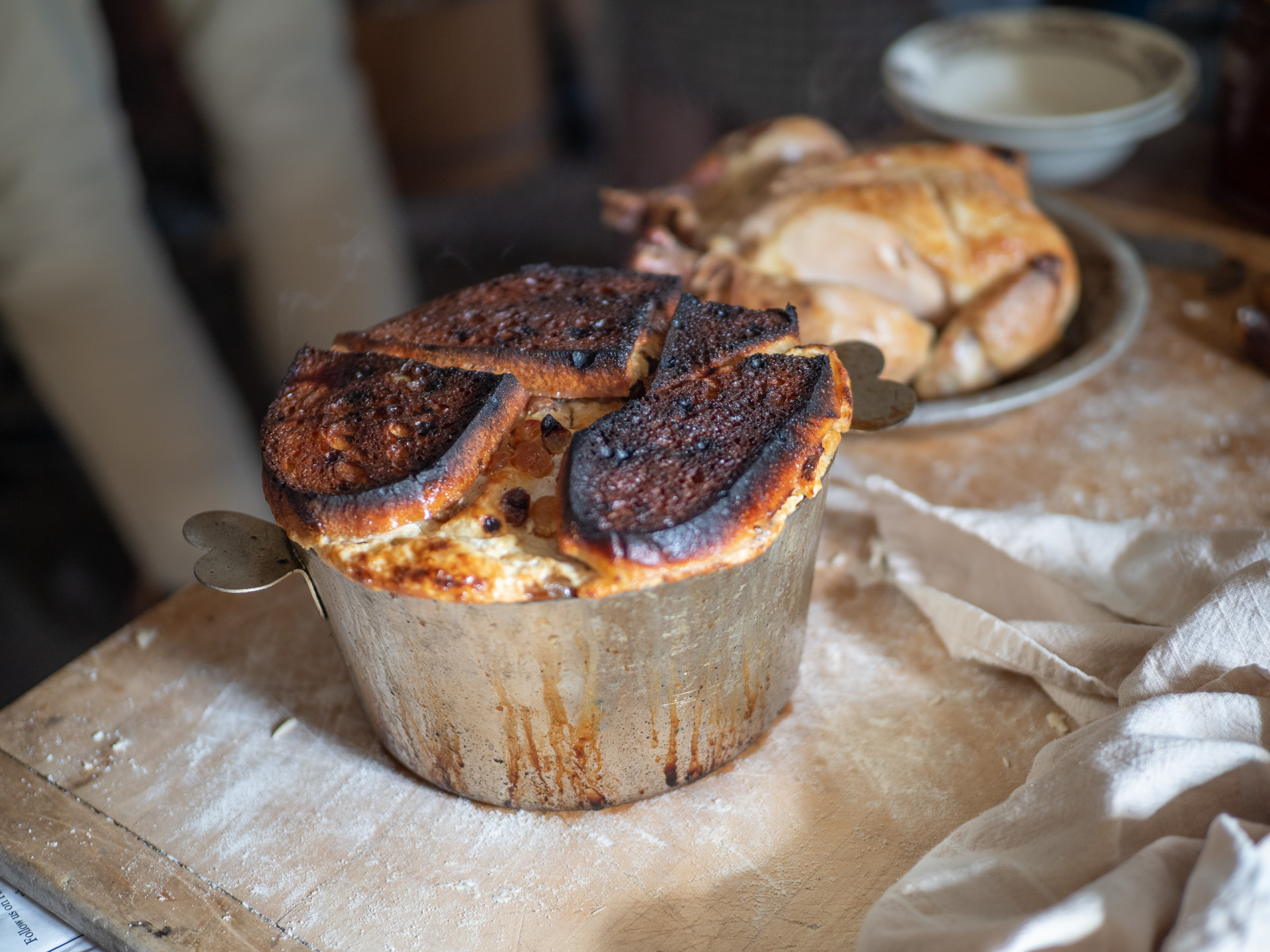 Plum pudding does not have plums, it has dried fruit. Topped with bread.