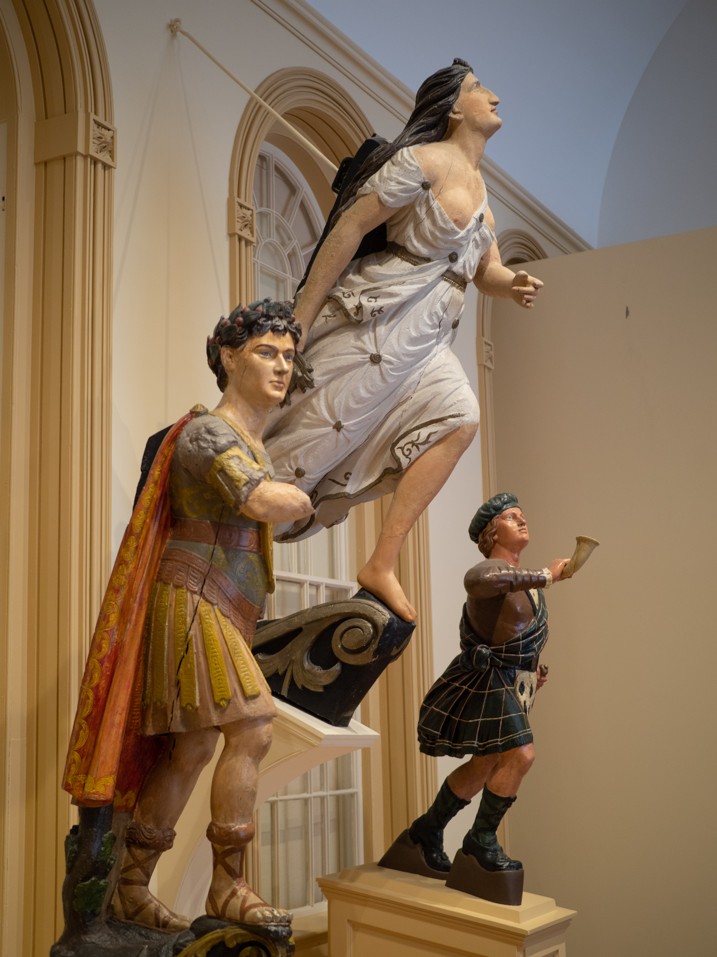 Ship figureheads at the East India Marine Society hall at the Peabody Essex Museum