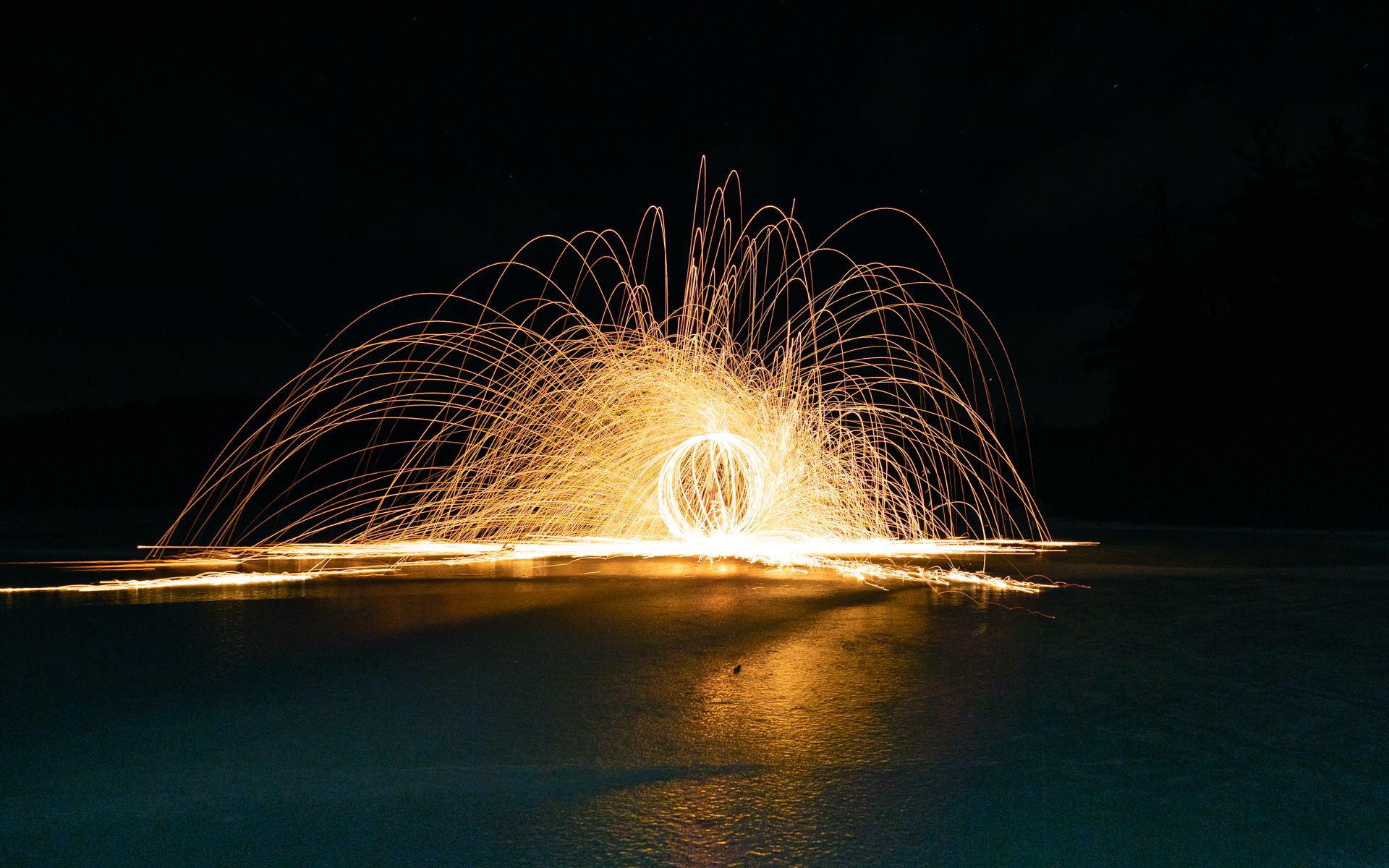Spinning steel wool on the ice with the photo club