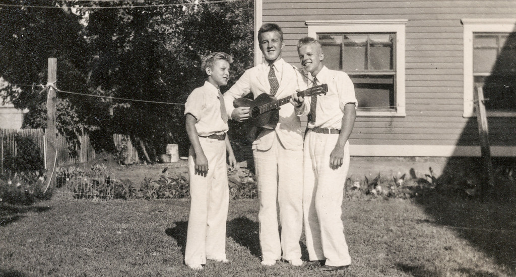 Eddie. Francis and Tony Poltrack with Francis on guitar
