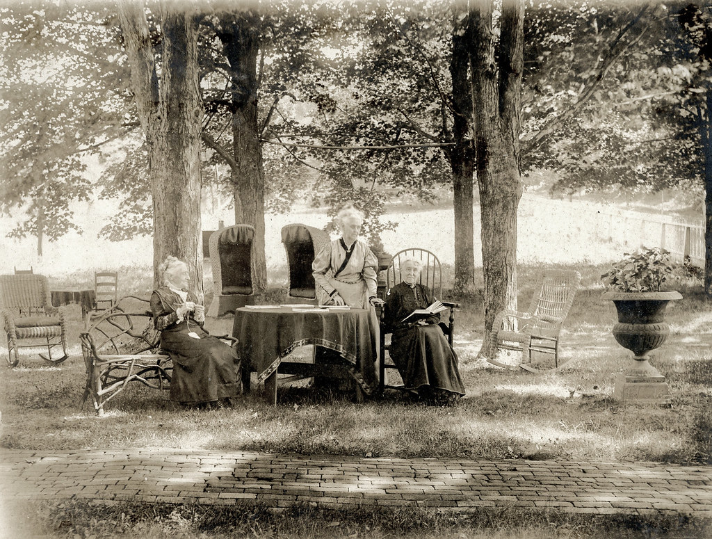 Three women at an elegant outside setting