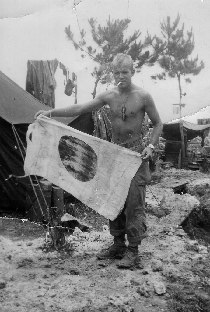 Tony Poltrack with captured Japanese Flag